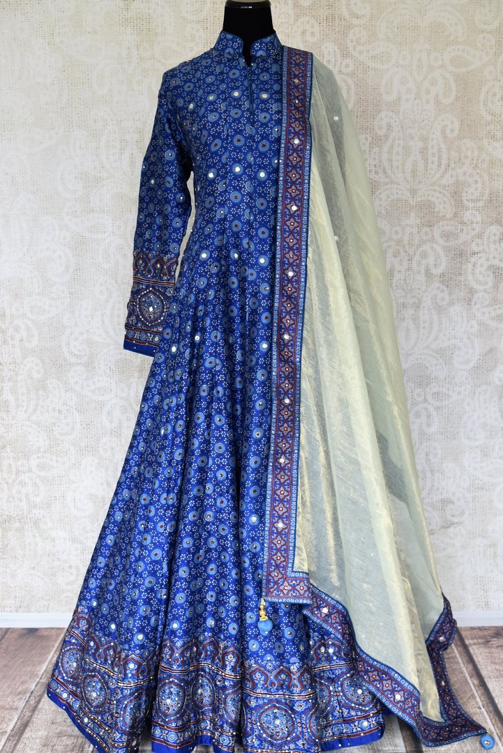 Buy blue Kalamkari print hand embroidered silk Anarkali online in USA. Be the talk of weddings and special occasions with a splendid collection of Indian designer suits from Pure Elegance Indian clothing store in USA. We have a spectacular range of designer dresses, bridal lehengas for Indian brides in USA.-full view