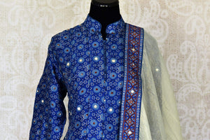 Buy blue Kalamkari print hand embroidered silk Anarkali online in USA. Be the talk of weddings and special occasions with a splendid collection of Indian designer suits from Pure Elegance Indian clothing store in USA. We have a spectacular range of designer dresses, bridal lehengas for Indian brides in USA.-front