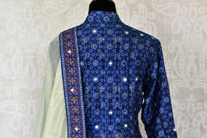 Buy blue Kalamkari print hand embroidered silk Anarkali online in USA. Be the talk of weddings and special occasions with a splendid collection of Indian designer suits from Pure Elegance Indian clothing store in USA. We have a spectacular range of designer dresses, bridal lehengas for Indian brides in USA.-back