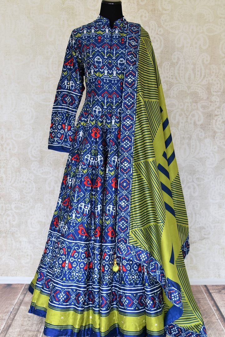 Buy blue hand work ikat silk Anarkali suit online in USA with green dupatta. Be the talk of weddings and special occasions with a splendid collection of Indian designer suits from Pure Elegance Indian clothing store in USA. We have a spectacular range of designer dresses, bridal lehengas for Indian brides in USA.-full view