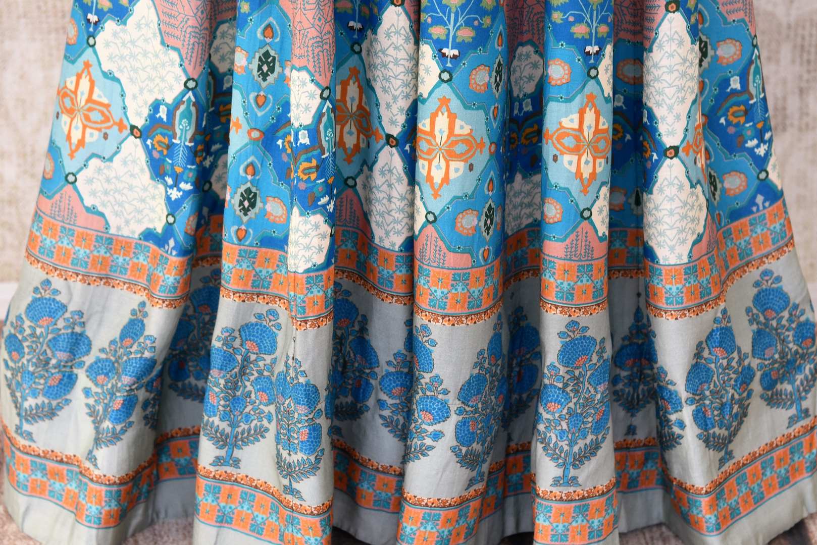 Shop beautiful blue printed silk Anarkali dress online in USA. Be the talk of weddings and special occasions with a splendid collection of Indian designer suits from Pure Elegance Indian clothing store in USA. We have a spectacular range of designer dresses, bridal lehengas for Indian brides in USA.-bottom