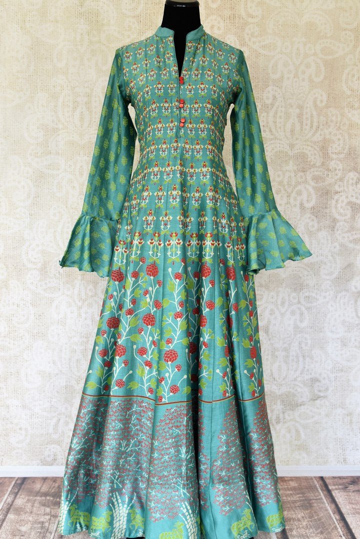 Buy green printed silk Anarkali dress online in USA with frilled sleeves. Be the talk of weddings and special occasions with a splendid collection of Indian designer suits from Pure Elegance Indian clothing store in USA. We have a spectacular range of designer dresses, bridal lehengas for Indian brides in USA.-full view