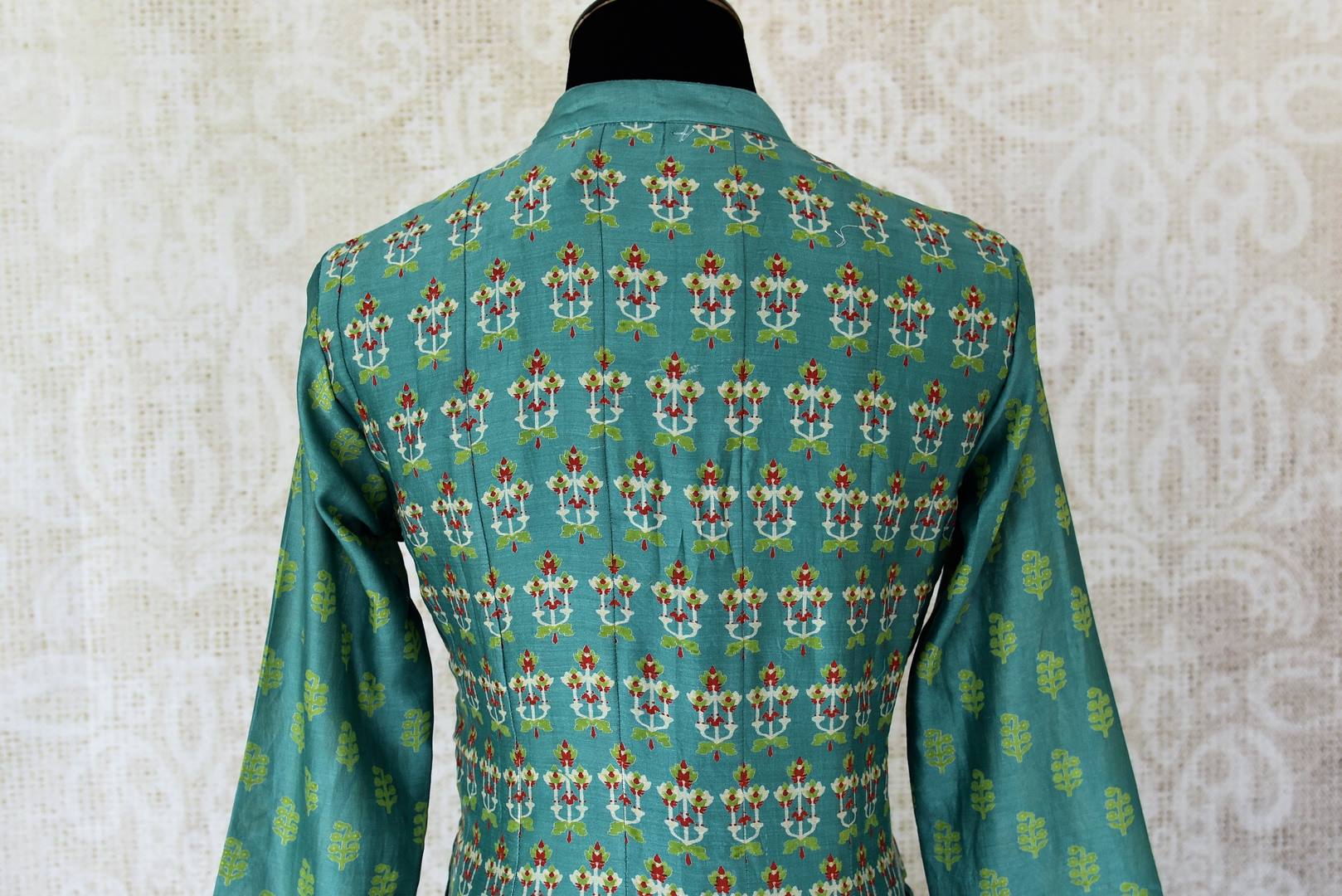 Buy green printed silk Anarkali dress online in USA with frilled sleeves. Be the talk of weddings and special occasions with a splendid collection of Indian designer suits from Pure Elegance Indian clothing store in USA. We have a spectacular range of designer dresses, bridal lehengas for Indian brides in USA.-back