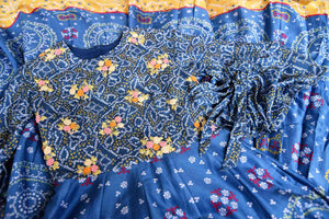 Buy blue Bandhej silk embroidered Anarkali dress online in USA. Be the talk of weddings and special occasions with a splendid collection of Indian designer suits from Pure Elegance Indian clothing store in USA. We have a spectacular range of designer dresses, designer lehengas for Indian women in USA.-details
