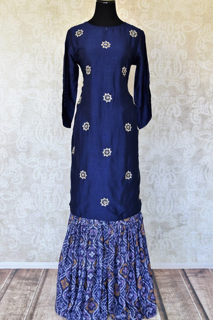 Shop blue embroidered silk top with Bandhej palazzo online in USA. Be the talk of weddings and special occasions with a splendid collection of Indian designer suits from Pure Elegance Indian clothing store in USA. We have a spectacular range of designer dresses, designer lehengas for Indian women in USA.-full view