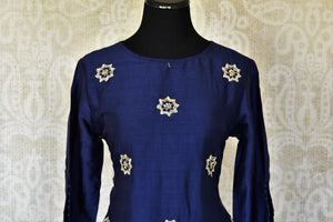 Shop blue embroidered silk top with Bandhej palazzo online in USA. Be the talk of weddings and special occasions with a splendid collection of Indian designer suits from Pure Elegance Indian clothing store in USA. We have a spectacular range of designer dresses, designer lehengas for Indian women in USA.-front