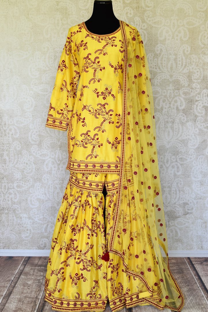 Buy yellow embroidered silk sharara suit online in USA with dupatta. Make special occasions even more special with your captivating traditional style in designer salwar suits from Pure Elegance Indian clothing in USA.-full view