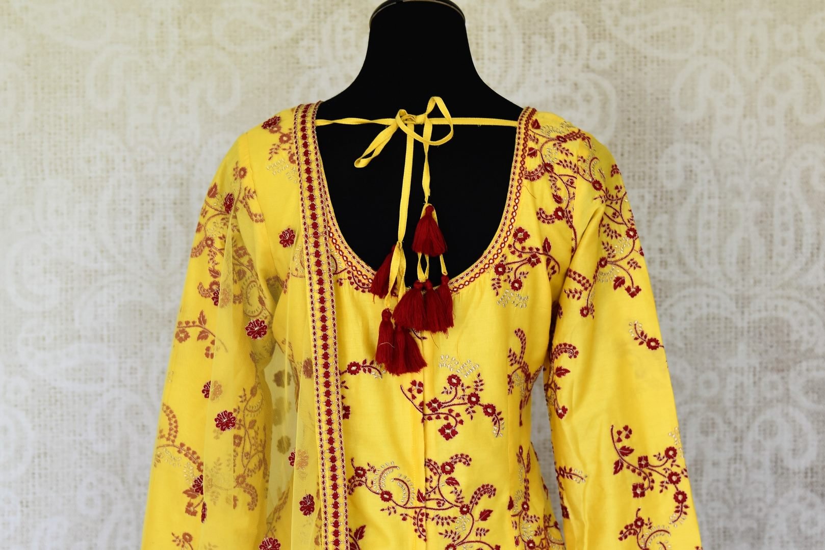 Buy yellow embroidered silk sharara suit online in USA with dupatta. Make special occasions even more special with your captivating traditional style in designer salwar suits from Pure Elegance Indian clothing in USA.-back