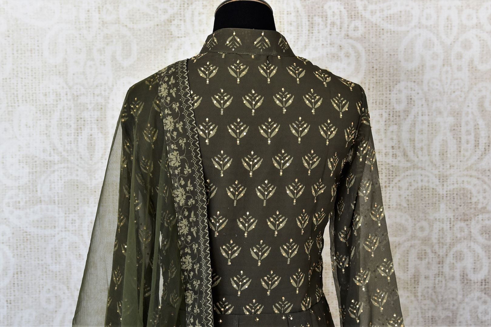 Grey printed georgette Anarkali suit for online shopping in USA with stonework. Get floored by a vibrant collection of Indian designer clothes at Pure Elegance Indian fashion store in USA. Choose from a beautiful range of Indian wedding dresses, designer lehengas and Anarkali suits for special occasions.-back