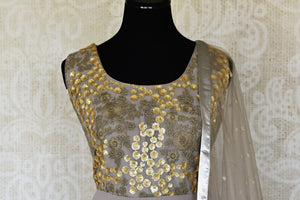Shop grey embroidered georgette net Anarkali suit online in USA with dupatta. Make fashionable choices with latest Indian designer clothing from Pure Elegance Indian fashion store in USA. Shop Indian salwar suits, designer Anarkali suits and bridal lehengas for Indian brides in USA from our online store.-front
