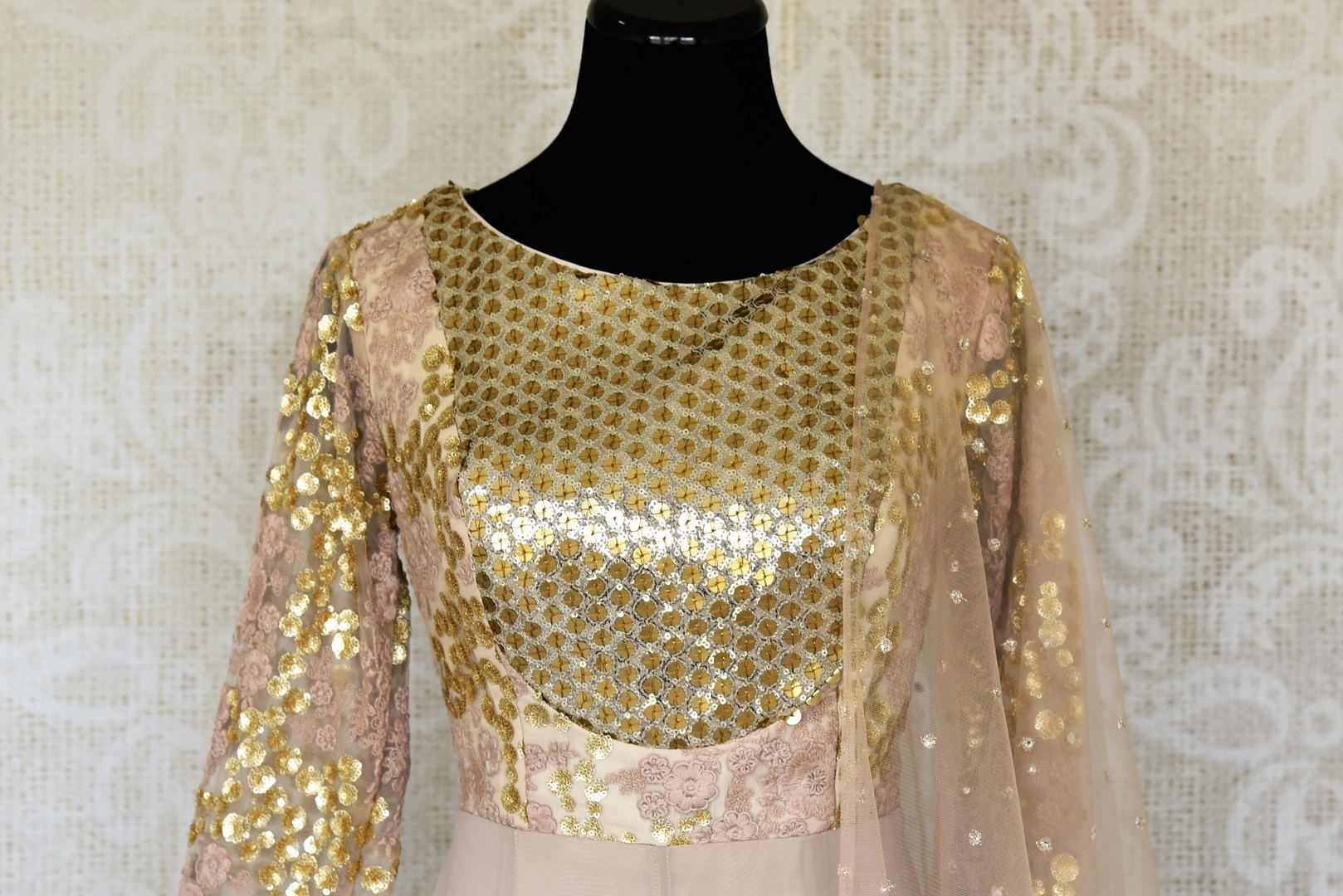 Buy dusty pink embroidered georgette net Anarkali suit online in USA with dupatta. Make fashionable choices with latest Indian designer clothing from Pure Elegance Indian fashion store in USA. Shop Indian salwar suits, designer Anarkali suits and bridal lehengas for Indian brides in USA from our online store.-front