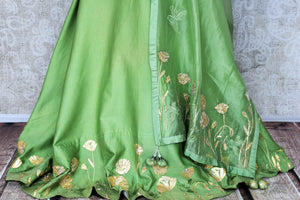 Green embroidered floorlength silk Anarkali for online shopping in USA with dupatta. Get floored by a vibrant collection of Indian designer clothes at Pure Elegance Indian fashion store in USA. Choose from a beautiful range of Indian wedding dresses, designer lehengas and suits for special occasions.-bottom