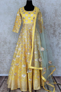 Lemon yellow gota work floorlength silk Anarkali for online shopping in USA with dupatta. Get floored by a vibrant collection of Indian designer clothes at Pure Elegance Indian fashion store in USA. Choose from a beautiful range of Indian wedding dresses, designer lehengas and suits for special occasions.-full view