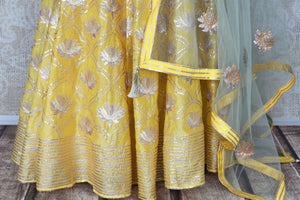 Lemon yellow gota work floorlength silk Anarkali for online shopping in USA with dupatta. Get floored by a vibrant collection of Indian designer clothes at Pure Elegance Indian fashion store in USA. Choose from a beautiful range of Indian wedding dresses, designer lehengas and suits for special occasions.-bottom