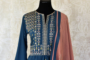 Buy dark blue embroidered cotton silk Anarkali suit online in USA with dupatta. Keep your wardrobe update with latest Indian clothing from Pure Elegance Indian fashion store in USA. Shop beautiful Indian designer lehengas, Anarkali suits, gowns for Indian women in USA from our online store.-front