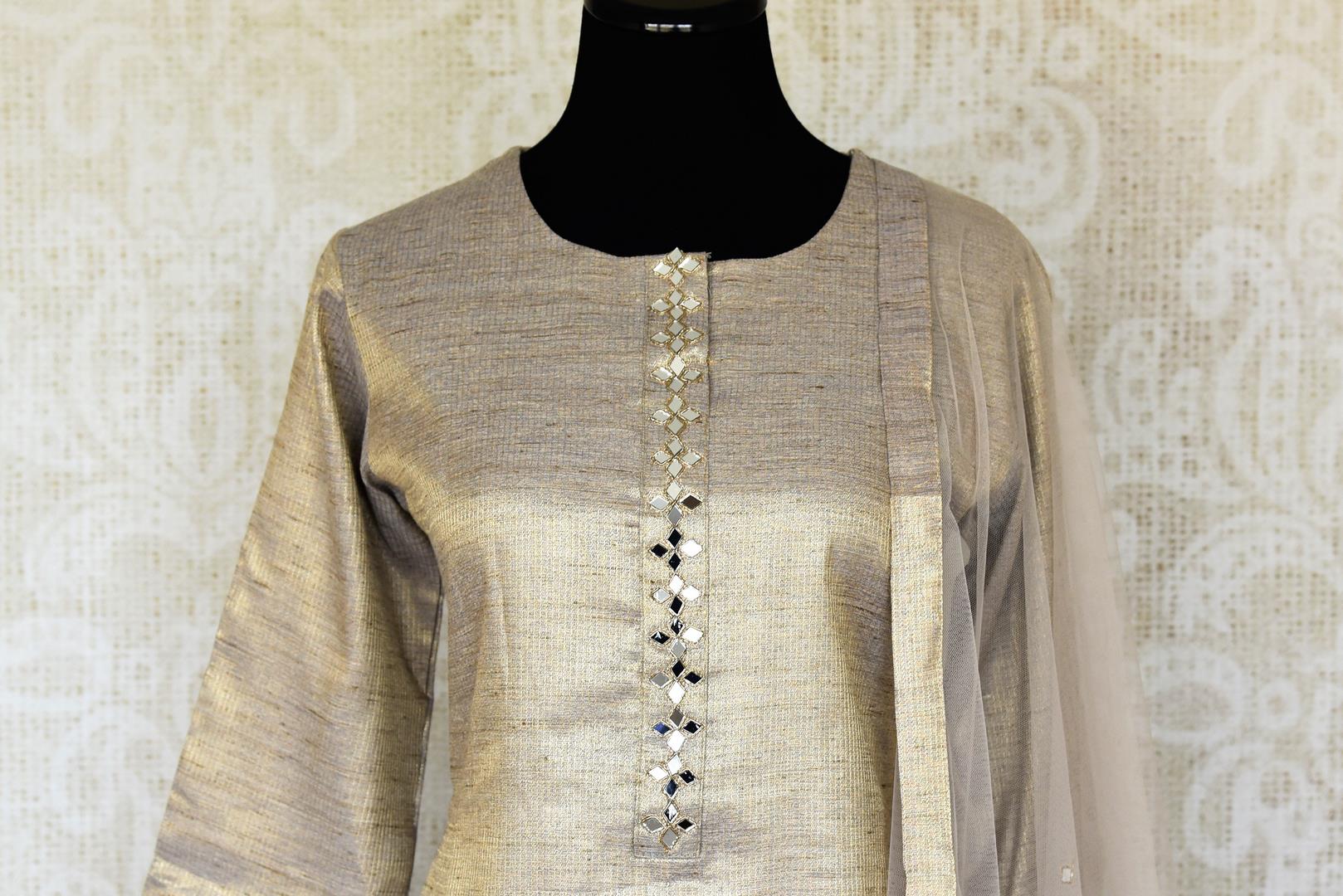 Shop beautiful golden and grey mirror work silk salwar suit online in USA with dupatta. Keep your wardrobe update with latest Indian clothing from Pure Elegance Indian fashion store in USA. Shop beautiful Indian designer lehengas, Anarkali suits, gowns for Indian women in USA from our online store.-front