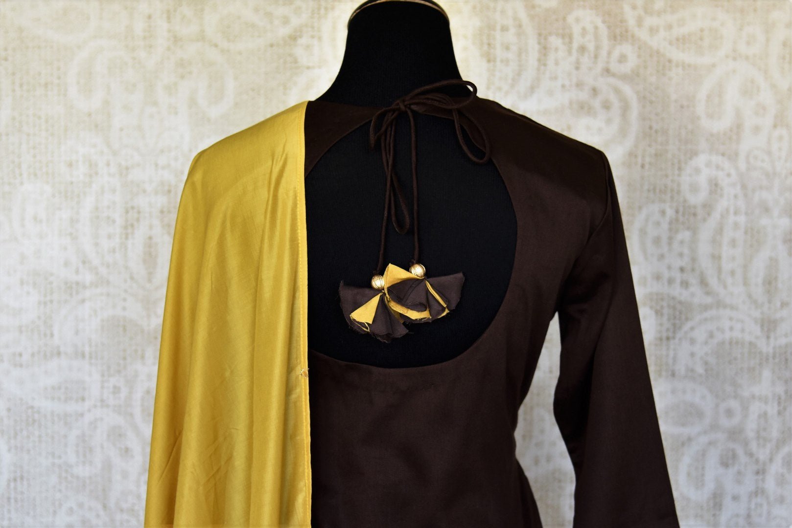 Buy coffee brown and mustard mirror work sharara suit online in USA with dupatta. Make fashionable choices with latest Indian designer clothes from Pure Elegance Indian fashion store in USA. Shop traditional Anarkali suits, designer lehengas for Indian brides in USA from our online store.-back