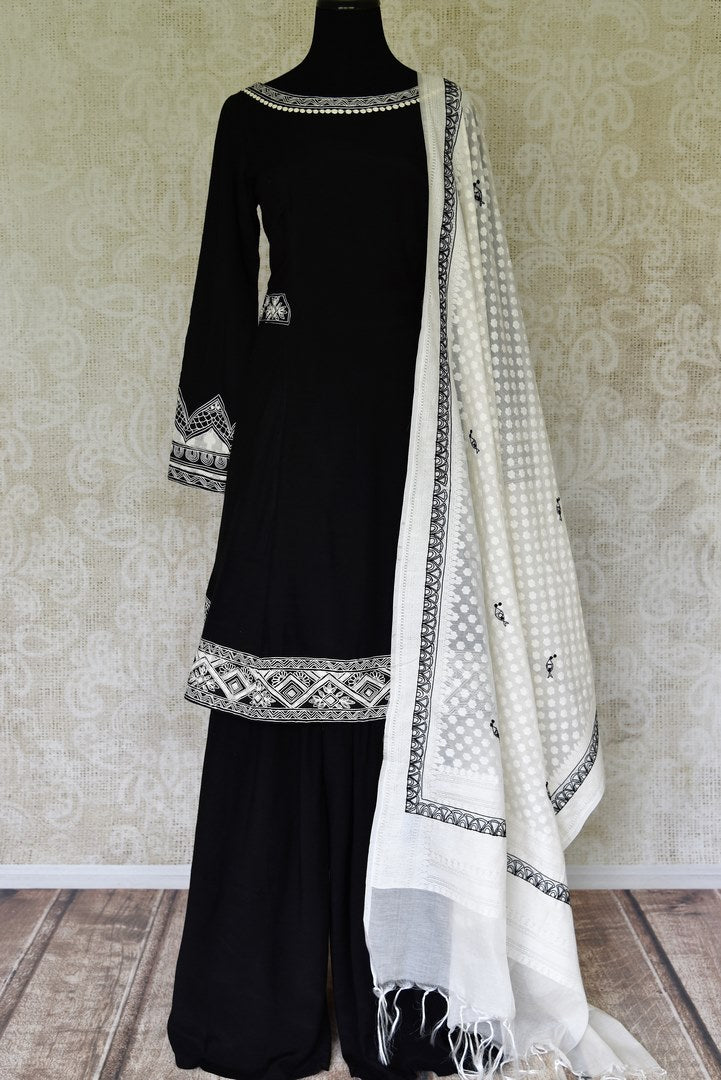 Shop beautiful black embroidered mulberry silk palazzo suit online in USA with white dupatta. Update your saree wardrobe with stunning Indian designer Anarkali suits from Pure Elegance Indian fashion store in USA. Shop now.-full view