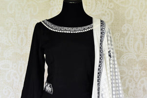 Shop beautiful black embroidered mulberry silk palazzo suit online in USA with white dupatta. Update your saree wardrobe with stunning Indian designer Anarkali suits from Pure Elegance Indian fashion store in USA. Shop now.-front