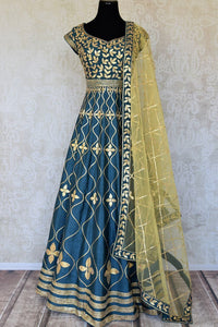 Buy teal blue lace applique silk Anarkali suit online in USA with yellow dupatta. Keep your wardrobe update with latest Indian clothing from Pure Elegance Indian fashion store in USA. Shop beautiful Indian designer lehengas, Anarkali suits, gowns for Indian women in USA from our online store.-full view