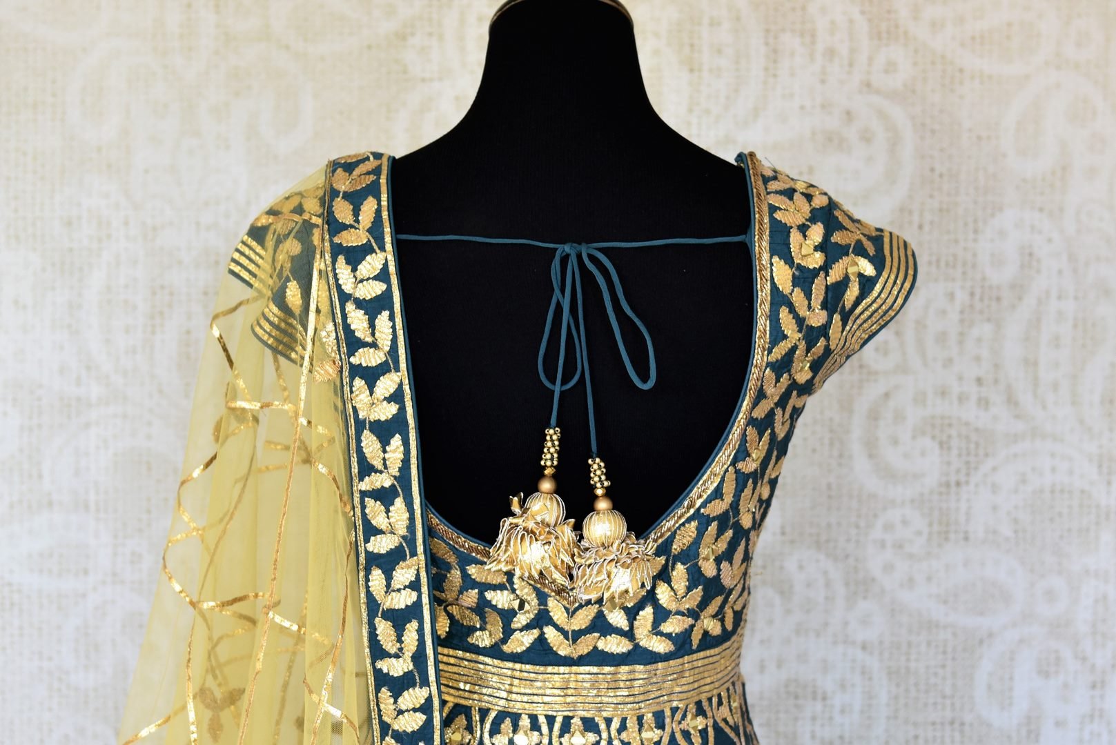 Buy teal blue lace applique silk Anarkali suit online in USA with yellow dupatta. Keep your wardrobe update with latest Indian clothing from Pure Elegance Indian fashion store in USA. Shop beautiful Indian designer lehengas, Anarkali suits, gowns for Indian women in USA from our online store.-back