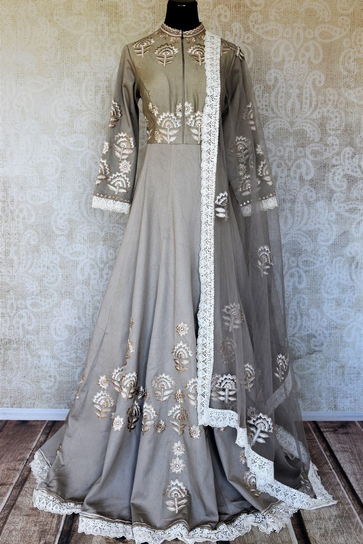 Buy grey silk embroidered floorlength Anarkali suit online in USA with dupatta. Keep your wardrobe update with latest Indian clothing from Pure Elegance Indian fashion store in USA. Shop beautiful Indian designer lehengas, Anarkali suits, gowns for Indian women in USA from our online store.-full view