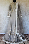 Buy grey silk embroidered floorlength Anarkali suit online in USA with dupatta. Keep your wardrobe update with latest Indian clothing from Pure Elegance Indian fashion store in USA. Shop beautiful Indian designer lehengas, Anarkali suits, gowns for Indian women in USA from our online store.-full view