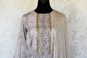 Buy grey printed stonework crepe palazzo suit online in USA with dupatta. Keep your wardrobe update with latest Indian clothing from Pure Elegance Indian fashion store in USA. Shop beautiful Indian designer lehengas, Anarkali suits, gowns for Indian women in USA from our online store.-front