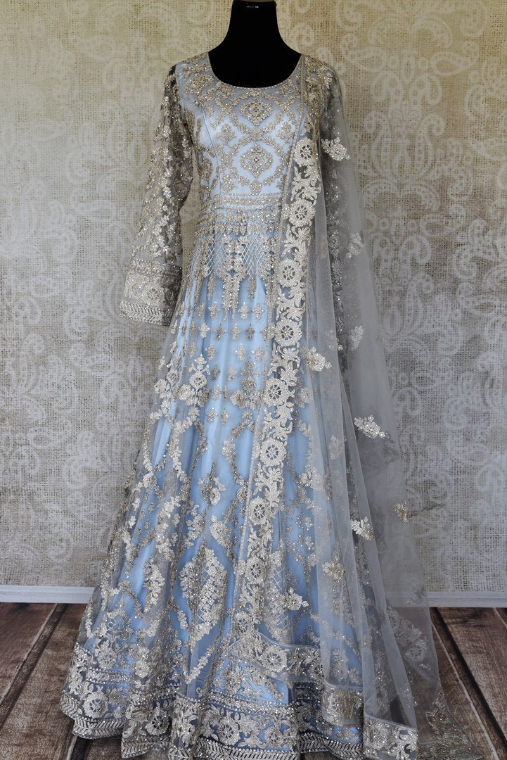 Buy powder blue embroidered net Anarkali suit online in USA with dupatta. Raise your ethnic style quotient at weddings and special occasions with exquisite Indian clothing from Pure Elegance Indian clothing store in USA. Pick from a tasteful collection of designer lehengas, Anarkali suits, Indian dresses. Shop now.-full view
