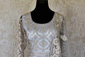 Buy powder blue embroidered net Anarkali suit online in USA with dupatta. Raise your ethnic style quotient at weddings and special occasions with exquisite Indian clothing from Pure Elegance Indian clothing store in USA. Pick from a tasteful collection of designer lehengas, Anarkali suits, Indian dresses. Shop now.-front