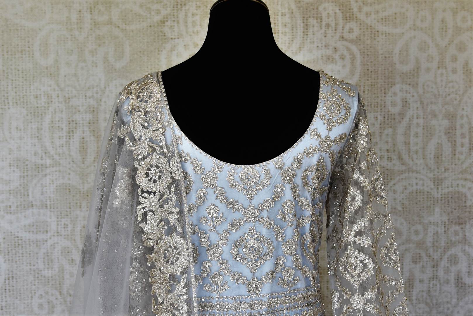 Buy powder blue embroidered net Anarkali suit online in USA with dupatta. Raise your ethnic style quotient at weddings and special occasions with exquisite Indian clothing from Pure Elegance Indian clothing store in USA. Pick from a tasteful collection of designer lehengas, Anarkali suits, Indian dresses. Shop now.-back