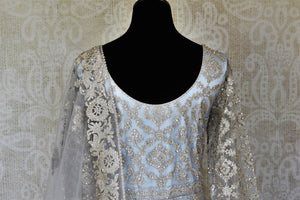 Buy powder blue embroidered net Anarkali suit online in USA with dupatta. Raise your ethnic style quotient at weddings and special occasions with exquisite Indian clothing from Pure Elegance Indian clothing store in USA. Pick from a tasteful collection of designer lehengas, Anarkali suits, Indian dresses. Shop now.-back
