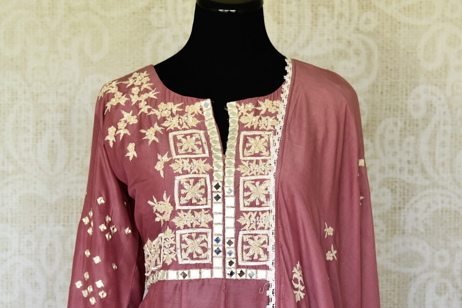 Buy onion pink mirror and hand embroidery silk suit online in USA with palazzo. Make special occasions even more special with your captivating traditional style in designer salwar suits from Pure Elegance Indian clothing in USA.-front
