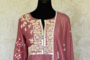 Buy onion pink mirror and hand embroidery silk suit online in USA with palazzo. Make special occasions even more special with your captivating traditional style in designer salwar suits from Pure Elegance Indian clothing in USA.-front