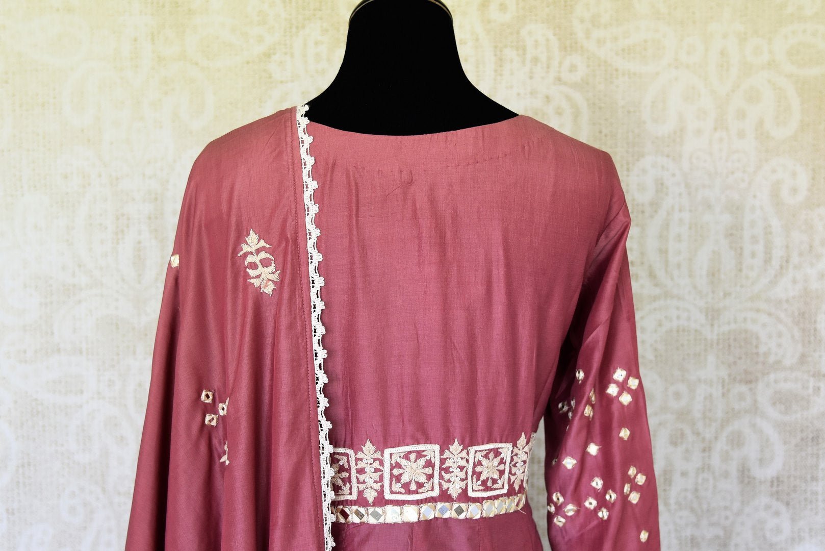 Buy onion pink mirror and hand embroidery silk suit online in USA with palazzo. Make special occasions even more special with your captivating traditional style in designer salwar suits from Pure Elegance Indian clothing in USA.-back