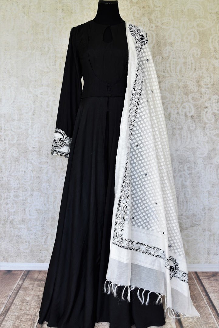Buy black cotton silk embroidered Anarkali suit online in USA with white dupatta. Relive tradition in Indian designer lehengas from Pure Elegance Indian clothing store in USA. Enhance your ethnic look with Indian dresses, Anarkali suits and Indowestern dresses available online.-full view