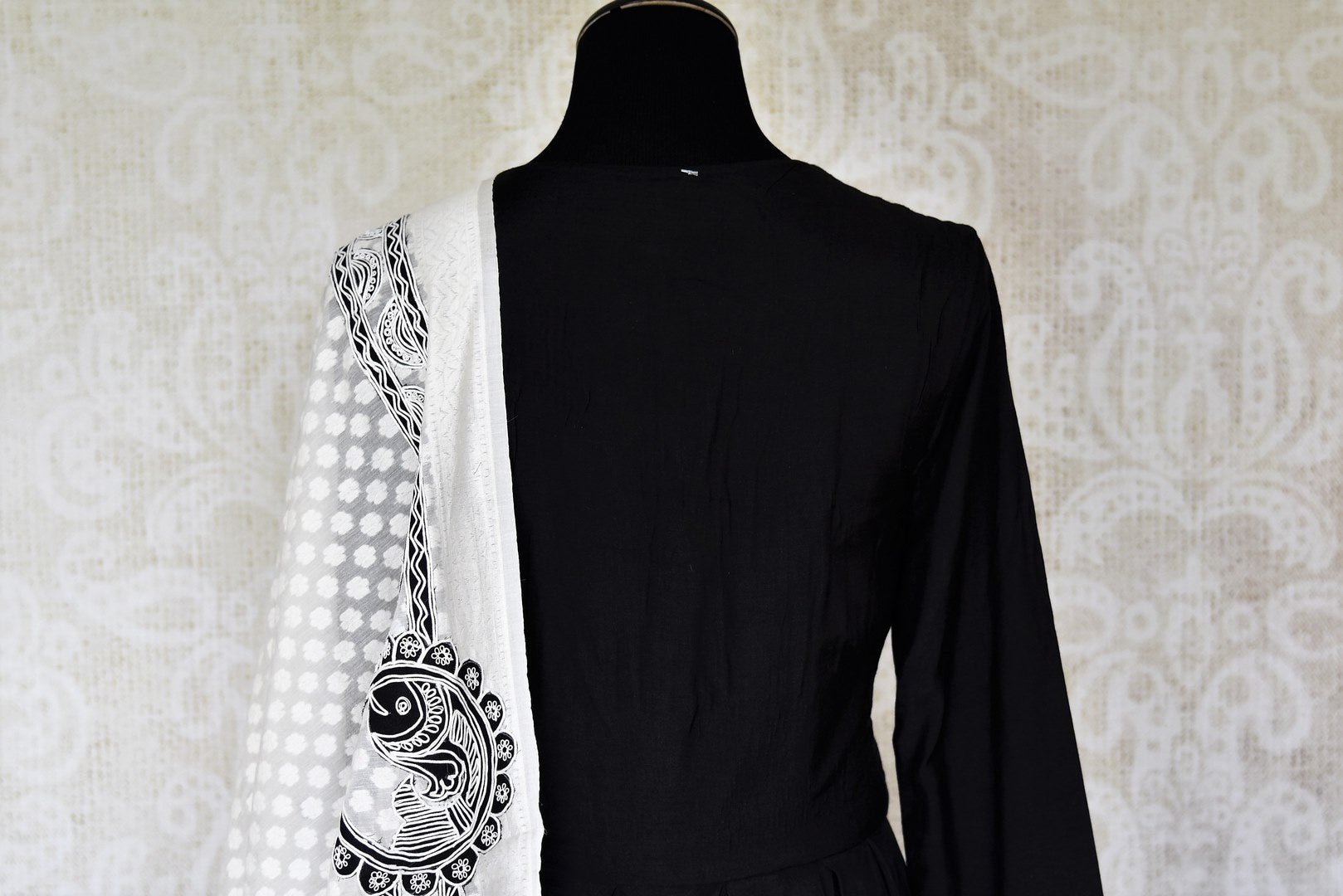 Buy black cotton silk embroidered Anarkali suit online in USA with white dupatta. Relive tradition in Indian designer lehengas from Pure Elegance Indian clothing store in USA. Enhance your ethnic look with Indian dresses, Anarkali suits and Indowestern dresses available online.-back