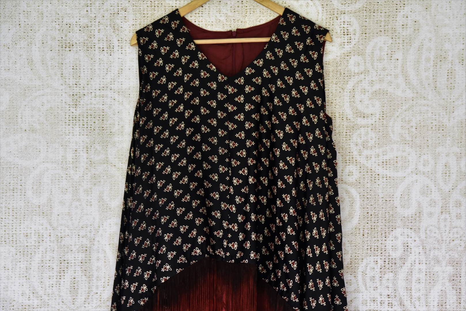 Shop black Ajrak gajji silk top online in USA with maroon pants. Be a vivid picture of ethnic fashion with an exquisite range of Indian designer clothing from Pure Elegance Indian clothing store in USA. Shop online.-front