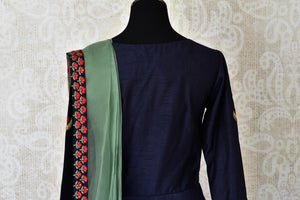 Buy navy blue embroidered silk Anarkali suit online in USA with green dupatta. Step up your ethnic fashion game with exquisite variety of designer Anarkali suits from Pure Elegance Indian clothing store in USA. Shop online.-back