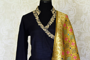 Buy elegant dark blue zardozi embroidery silk Anarkali suit online in USA with yellow dupatta. Step up your ethnic fashion game with exquisite variety of designer suits from Pure Elegance Indian clothing store in USA. Shop online.-front