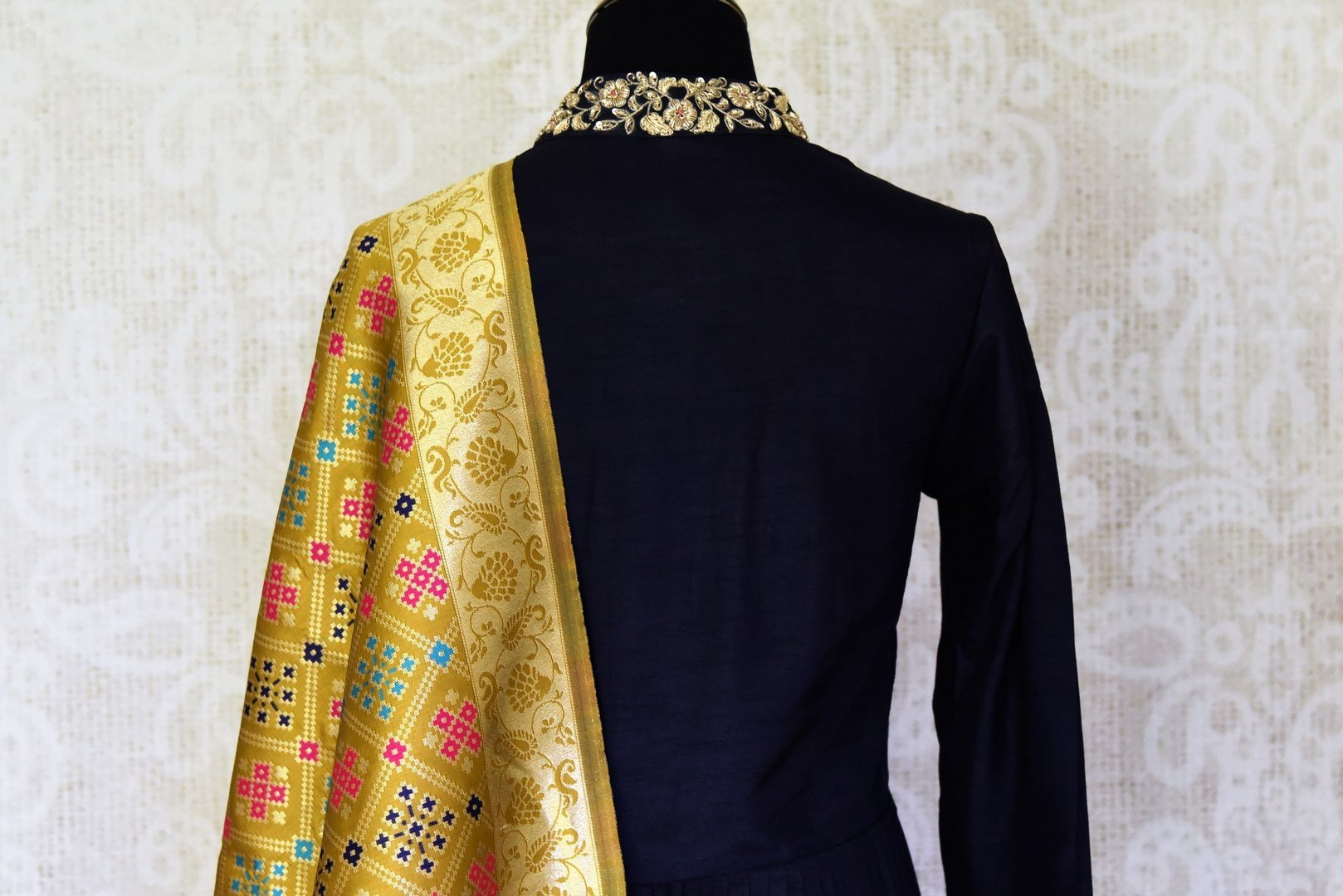 Buy elegant dark blue zardozi embroidery silk Anarkali suit online in USA with yellow dupatta. Step up your ethnic fashion game with exquisite variety of designer suits from Pure Elegance Indian clothing store in USA. Shop online.-back