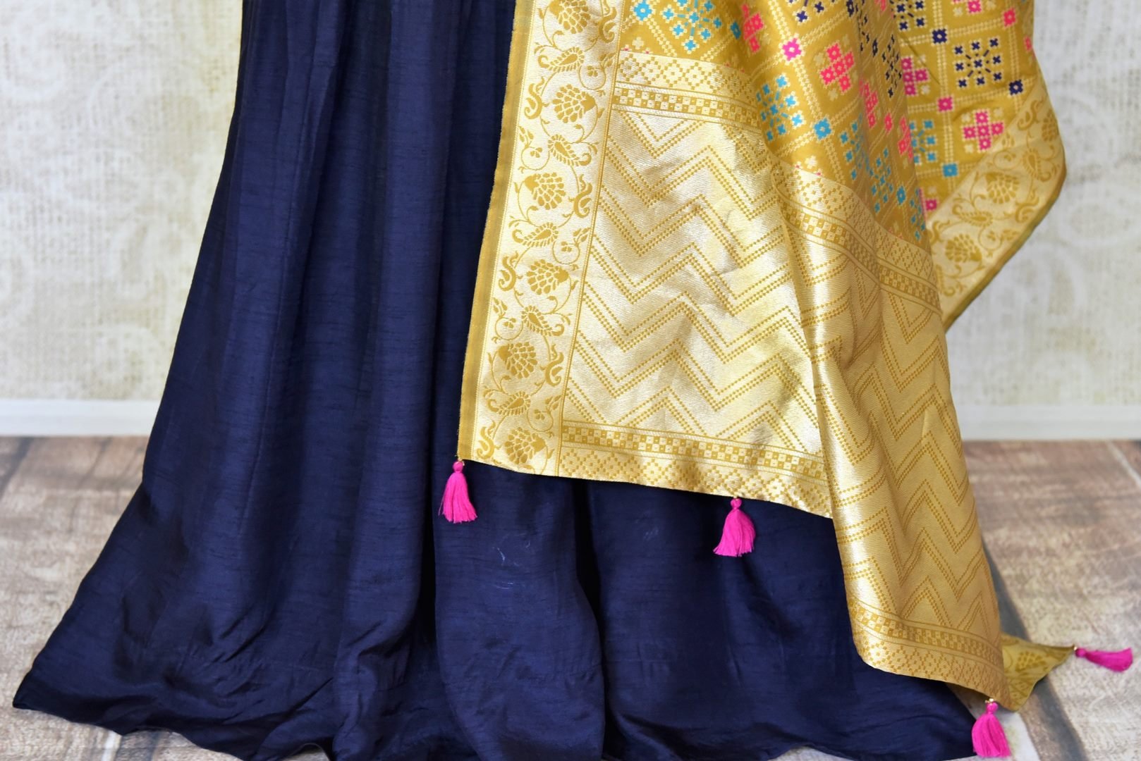 Buy elegant dark blue zardozi embroidery silk Anarkali suit online in USA with yellow dupatta. Step up your ethnic fashion game with exquisite variety of designer suits from Pure Elegance Indian clothing store in USA. Shop online.-bottom