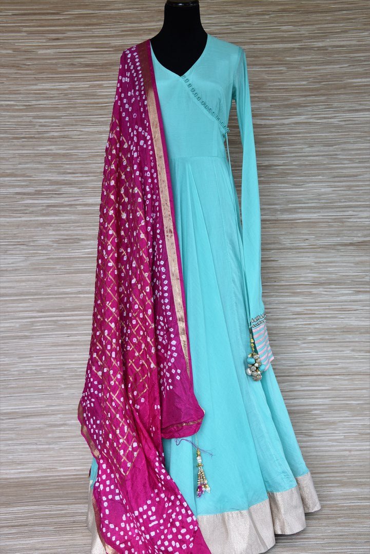 Buy sky blue chanderi silk floorlength Anarkali suit online in USA with magenta bandhej dupatta. Get your hands on exquisite Indian designer Anarkali suits in USA from Pure Elegance Indian clothing store for various special occasions like weddings and parties. Shop online now.-full view