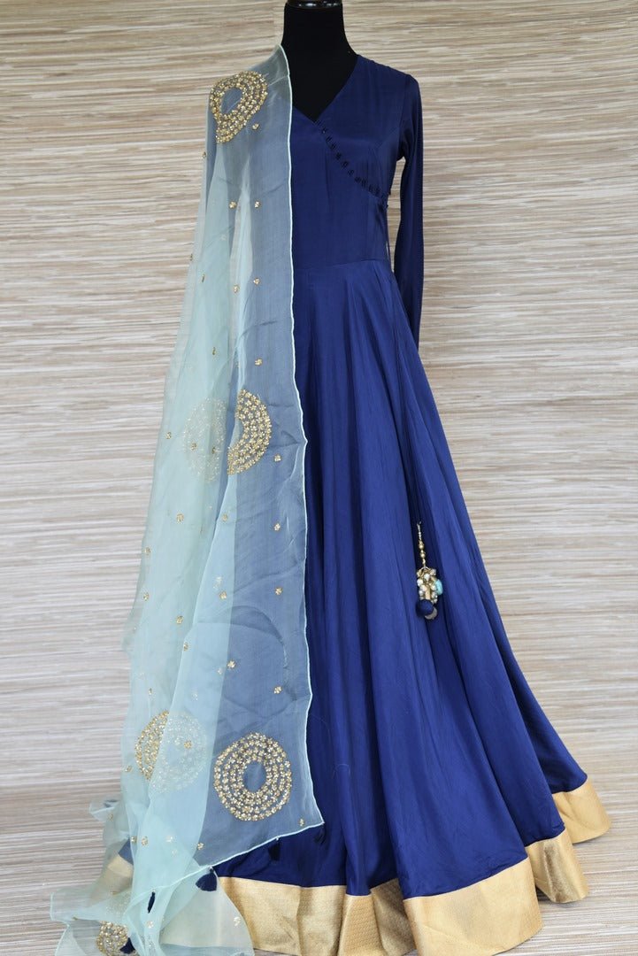 Buy beautiful dark blue chanderi silk floorlength Anarkali suit online in USA with light blue embroidered dupatta. Get your hands on exquisite Indian designer Anarkali suits in USA from Pure Elegance Indian clothing store for various special occasions like weddings and parties. Shop online now.-full view