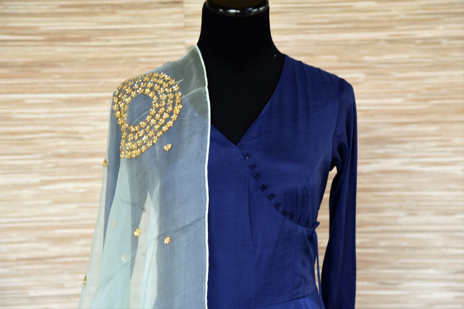 Buy beautiful dark blue chanderi silk floorlength Anarkali suit online in USA with light blue embroidered dupatta. Get your hands on exquisite Indian designer Anarkali suits in USA from Pure Elegance Indian clothing store for various special occasions like weddings and parties. Shop online now.-top