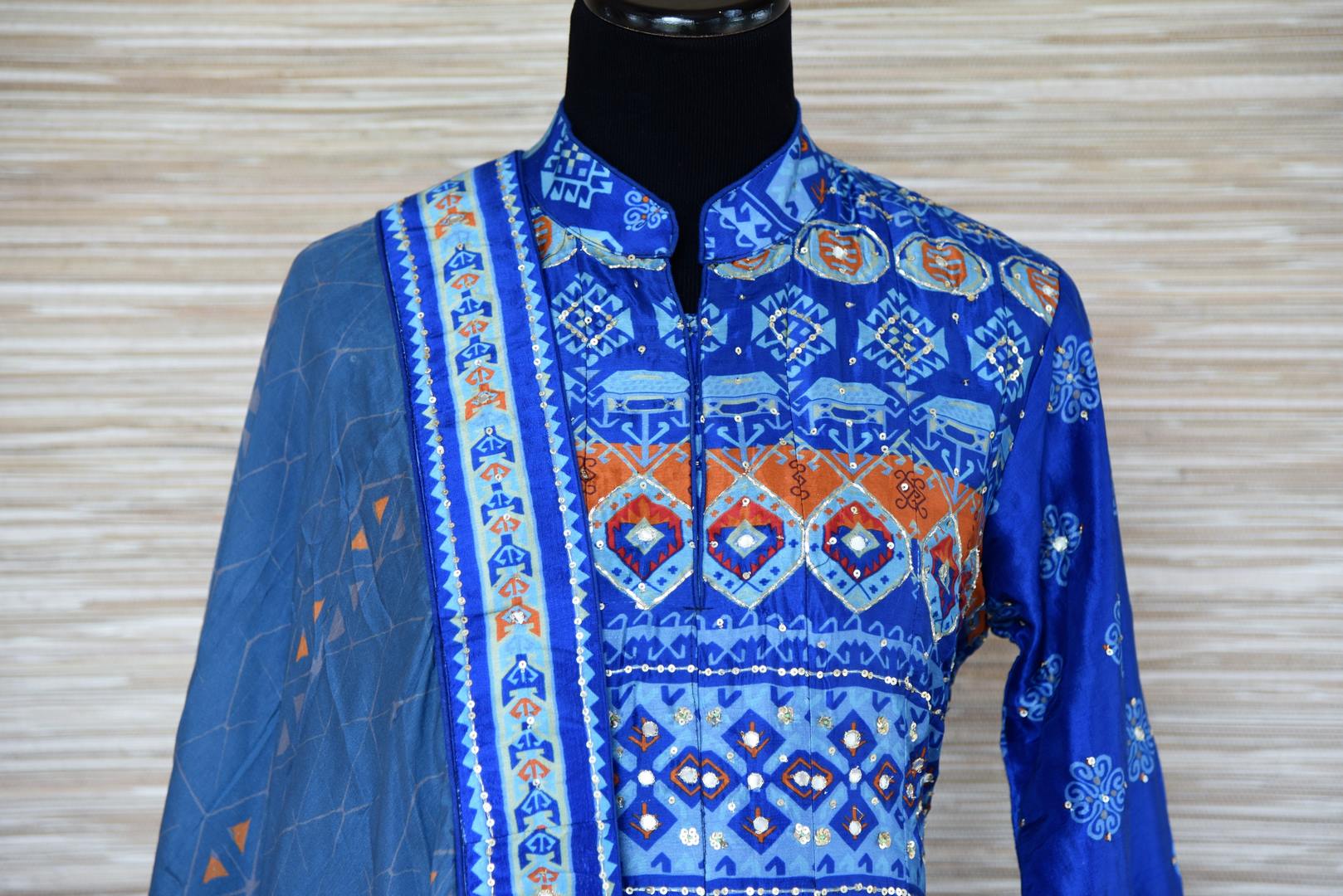Shop blue embroidered silk Anarkali suit online in USA with dupatta. Shop more such exquisite designer Anarkali suits in USA from Pure Elegance Indian clothing store for women.-top