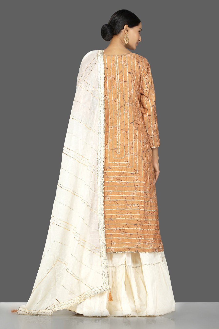 Shop beautiful orange and cream gota work chanderi cotton suit online in USA with dupatta. Be an epitome of Indian fashion with a premium range of designer suits, Anarkali dresses from Pure Elegance luxury Indian fashion store in USA. Buy online now.-back