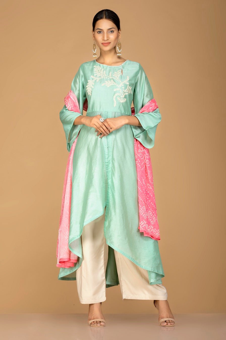 Buy elegant mint green and cream chanderi silk palazzo suit online in USA with pink dupatta. Be an epitome of Indian fashion with a premium range of designer suits, Anarkali dresses from Pure Elegance luxury Indian fashion store in USA. Buy online now.-full view