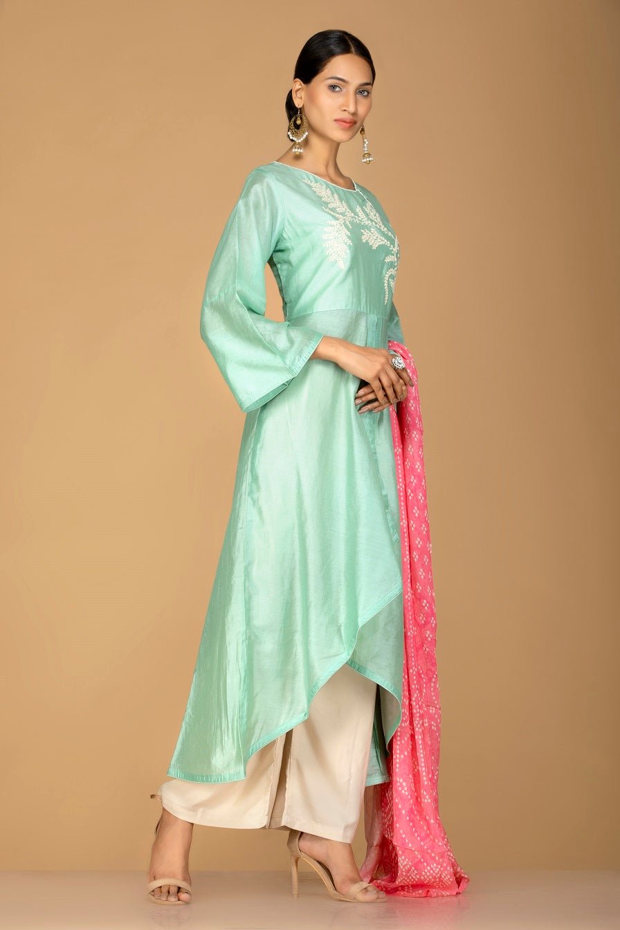 Buy elegant mint green and cream chanderi silk palazzo suit online in USA with pink dupatta. Be an epitome of Indian fashion with a premium range of designer suits, Anarkali dresses from Pure Elegance luxury Indian fashion store in USA. Buy online now.-side