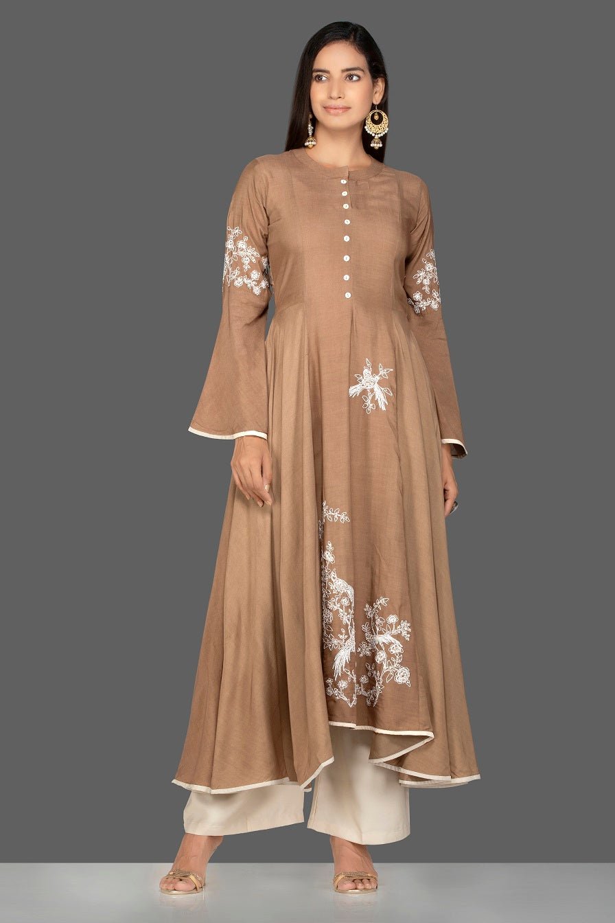 Shop beautiful brown modal silk palazzo suit online in USA. Be an epitome of Indian fashion with a premium range of designer suits, Anarkali dresses from Pure Elegance luxury Indian fashion store in USA. Buy online now.-front
